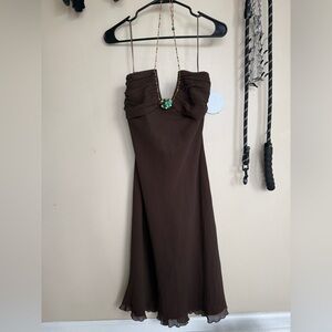 Express Chocolate Dress with Green Chain Around the Neck Accent